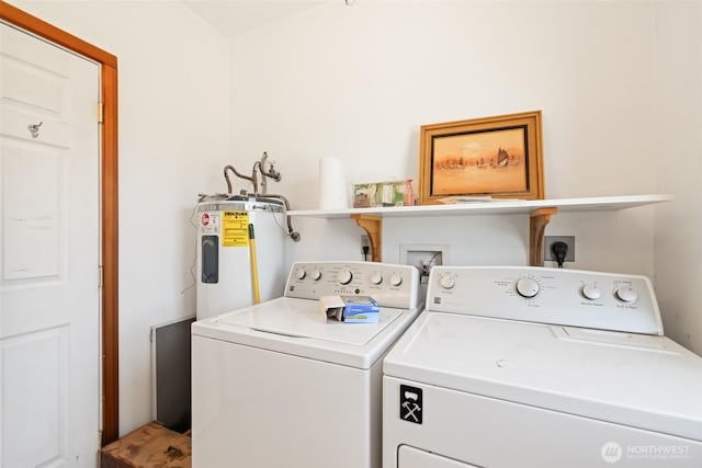 219 W 15th St, Port Angeles, WA 98362 - clothes washing area with laundry area, water heater, and washer and clothes dryer