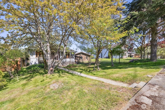 219 W 15th St, Port Angeles, WA 98362 - view of yard featuring a porch
