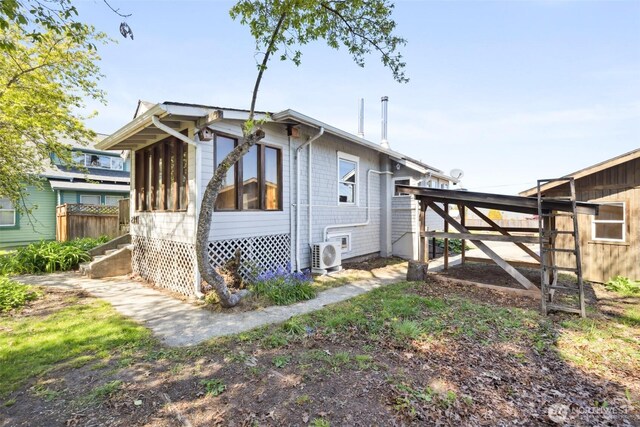 219 W 15th St, Port Angeles, WA 98362 - view of property exterior featuring fence and ac unit