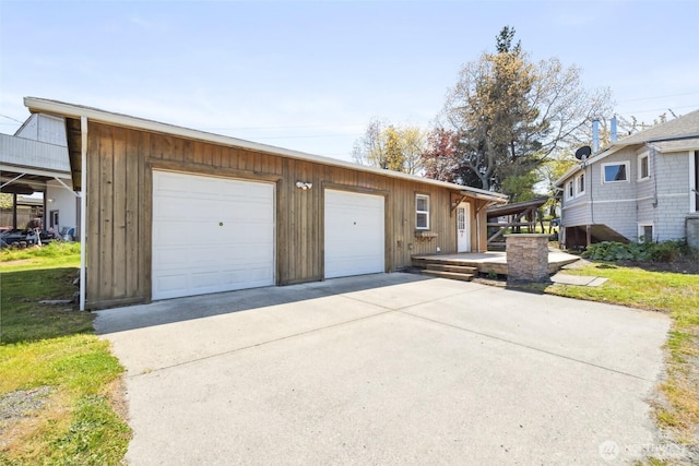 219 W 15th St, Port Angeles, WA 98362 - ranch-style home featuring a detached garage, an outbuilding, and board and batten siding