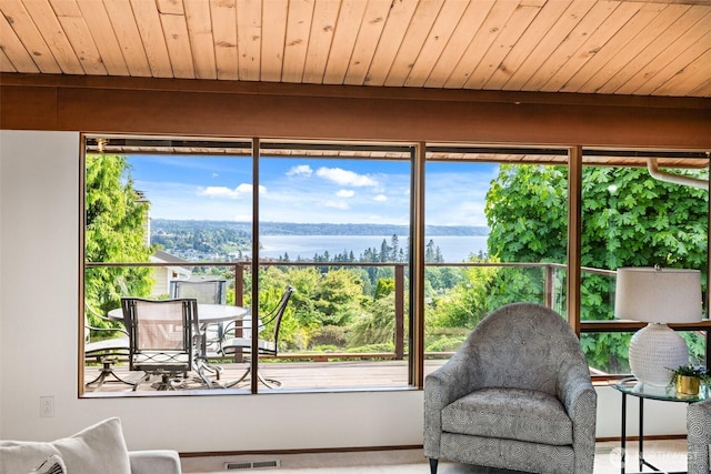 517 S 212th St, Des Moines, WA 98198 - sunroom featuring a water view