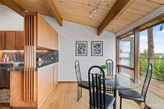 517 S 212th St, Des Moines, WA 98198 - dining room with beam ceiling, light wood finished floors, and wood ceiling