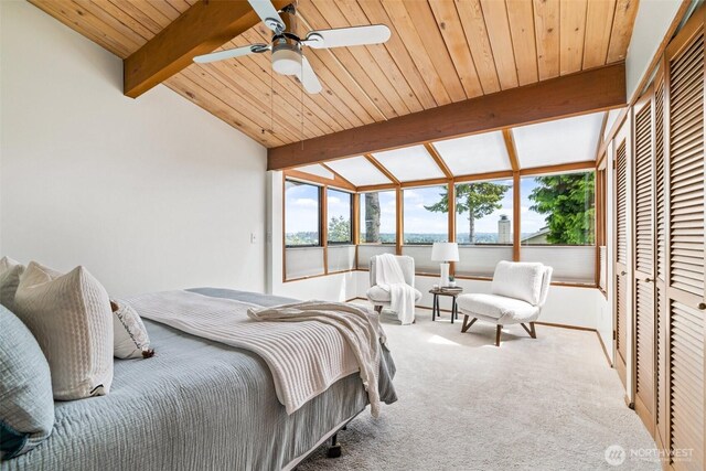 517 S 212th St, Des Moines, WA 98198 - carpeted bedroom featuring multiple windows, wooden ceiling, and a water view