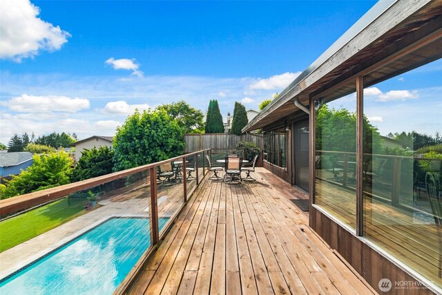 517 S 212th St, Des Moines, WA 98198 - wooden deck with outdoor dining space and a fenced backyard