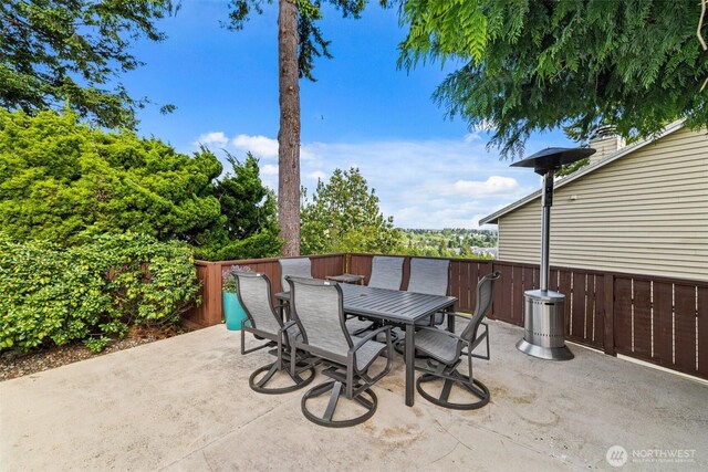 517 S 212th St, Des Moines, WA 98198 - view of patio featuring fence and outdoor dining area