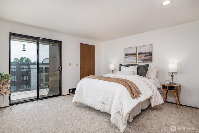 10601 Bagley Ave N Unit 204, Seattle, WA 98133 - bedroom with access to outside, light colored carpet, baseboards, and recessed lighting