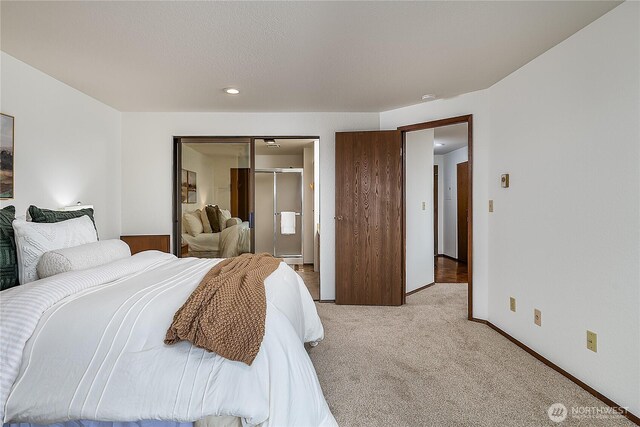 10601 Bagley Ave N Unit 204, Seattle, WA 98133 - bedroom featuring light carpet, baseboards, and recessed lighting