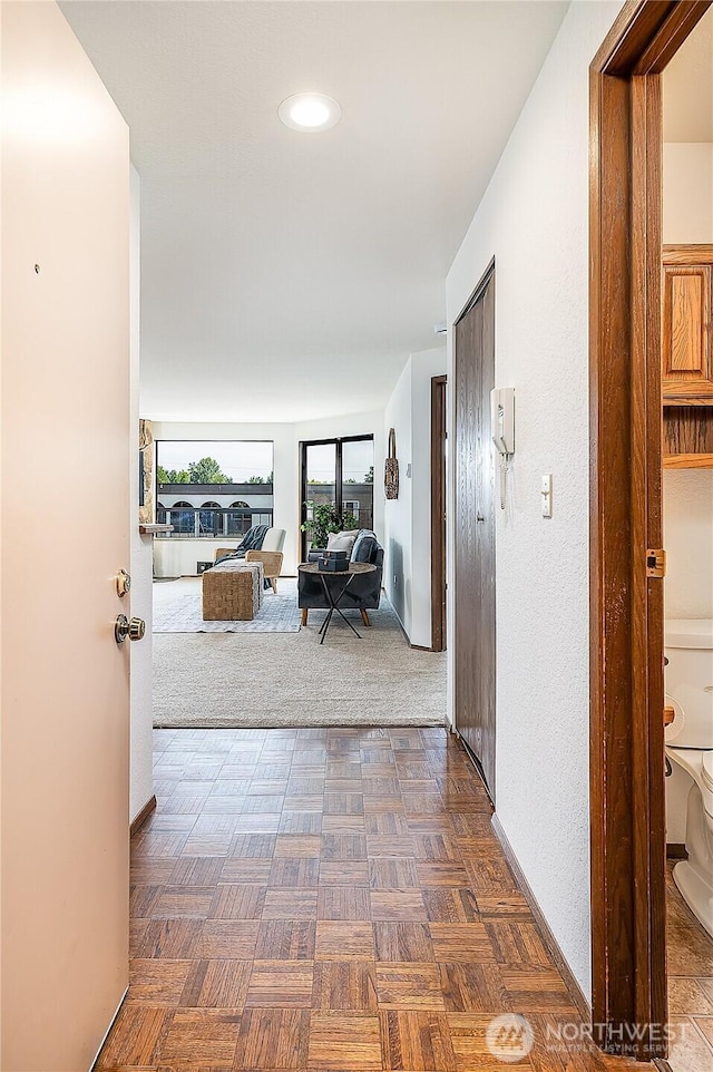 10601 Bagley Ave N Unit 204, Seattle, WA 98133 - corridor with baseboards