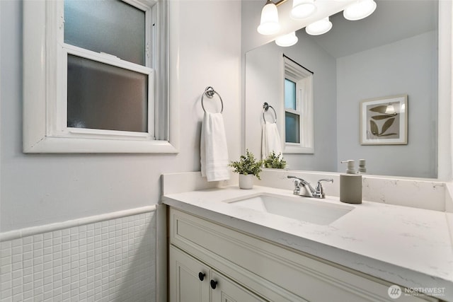 624 S Lawrence St, Tacoma, WA 98405 - bathroom featuring vanity and a wainscoted wall