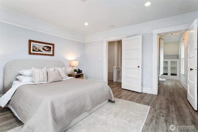 624 S Lawrence St, Tacoma, WA 98405 - bedroom featuring wood finished floors, recessed lighting, and baseboards