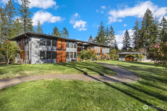 exterior space featuring a lawn