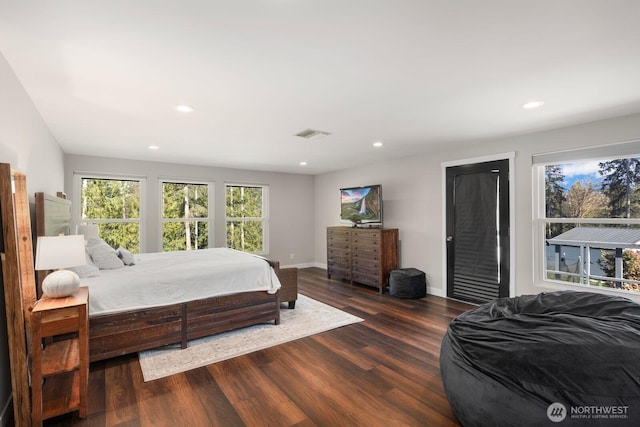 bedroom featuring recessed lighting, baseboards, visible vents, and wood finished floors