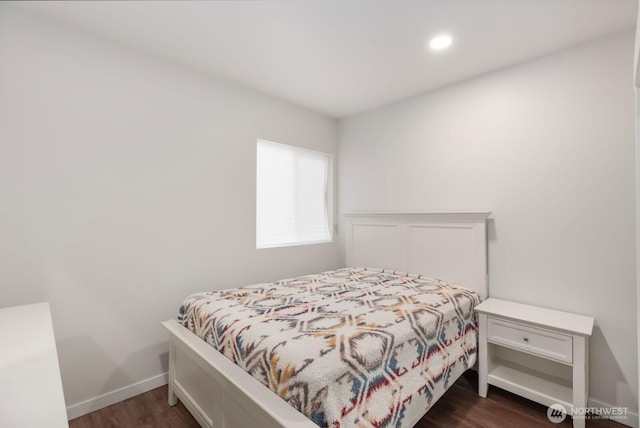 bedroom featuring dark wood-style flooring and recessed lighting
