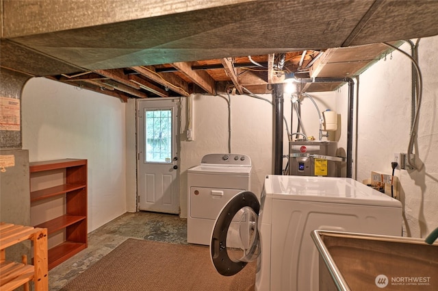 10733 14th Ave NE, Seattle, WA 98125 - laundry room with washer and clothes dryer and water heater