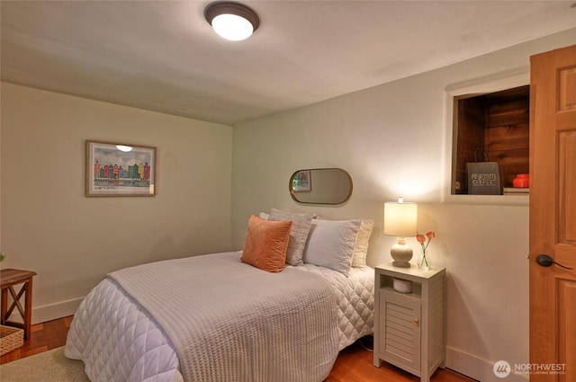10733 14th Ave NE, Seattle, WA 98125 - bedroom featuring wood finished floors and baseboards