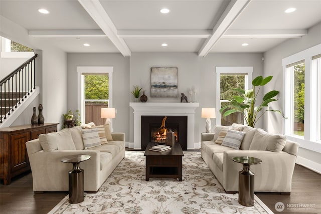 4161 86th Ave SE, Mercer Island, WA 98040 - living area with wood finished floors, plenty of natural light, beam ceiling, a glass covered fireplace, and recessed lighting