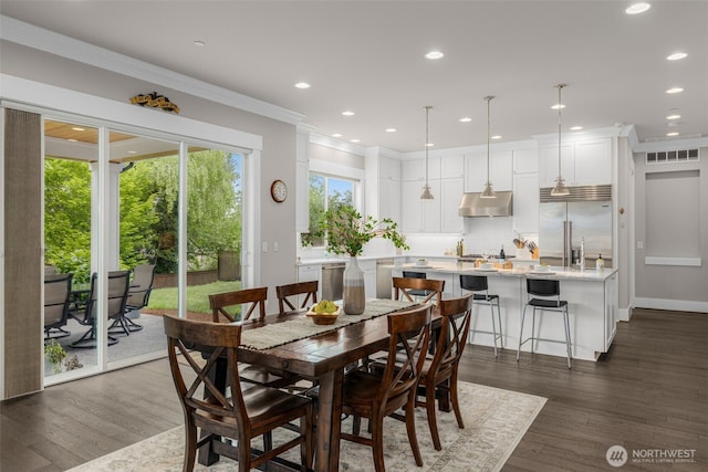 4161 86th Ave SE, Mercer Island, WA 98040 - dining space featuring dark wood finished floors, crown molding, and recessed lighting