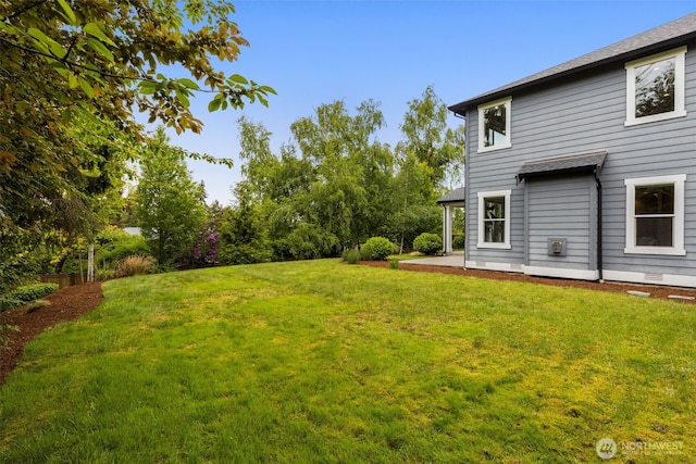 4161 86th Ave SE, Mercer Island, WA 98040 - view of grassy yard with a patio area