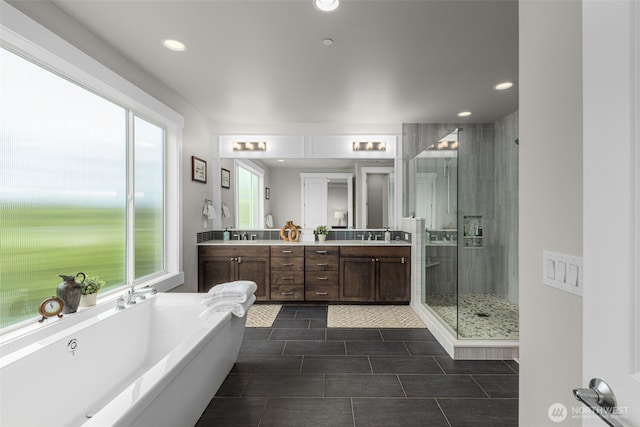 4161 86th Ave SE, Mercer Island, WA 98040 - bathroom with a shower stall, a freestanding bath, double vanity, and recessed lighting