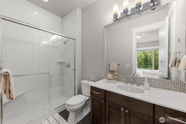 4161 86th Ave SE, Mercer Island, WA 98040 - bathroom with a stall shower, toilet, vanity, and tile patterned flooring