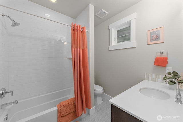 4161 86th Ave SE, Mercer Island, WA 98040 - bathroom with toilet, shower / bathtub combination with curtain, vanity, and baseboards