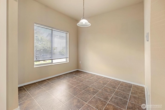 5305 Military Rd E Unit D, Tacoma, WA 98446 - spare room with dark tile patterned flooring and baseboards