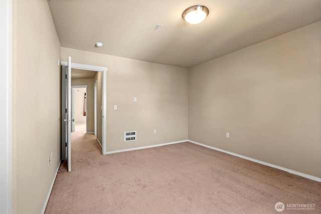 5305 Military Rd E Unit D, Tacoma, WA 98446 - empty room featuring light colored carpet, baseboards, and fire sprinkler in ceiling