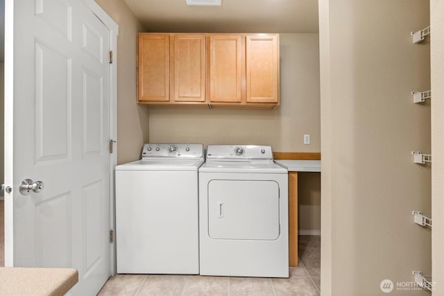 5305 Military Rd E Unit D, Tacoma, WA 98446 - clothes washing area with separate washer and dryer, light tile patterned floors, and cabinet space