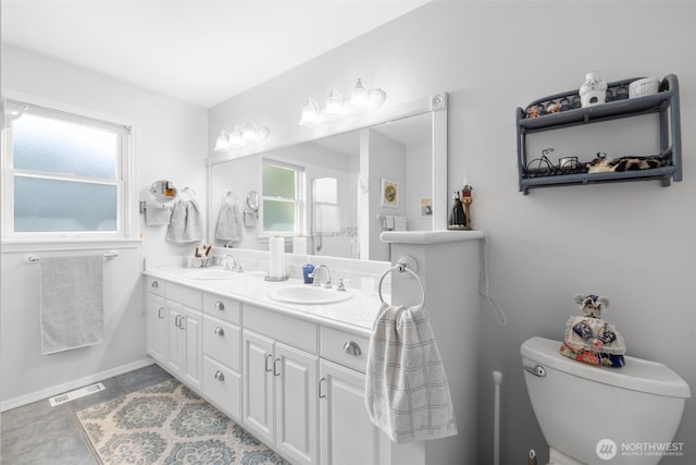 181 Amethyst Dr, Sequim, WA 98382 - bathroom with toilet, plenty of natural light, and double vanity
