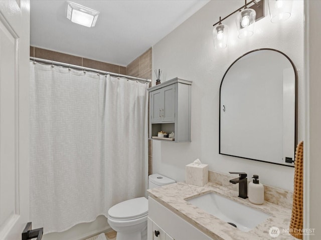 455 Newport Way NW Unit 302, Issaquah, WA 98027 - full bath featuring toilet, vanity, and shower / tub combo