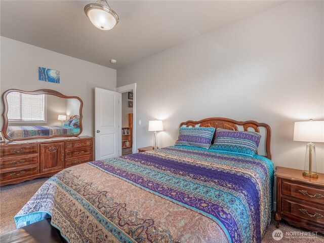 bedroom featuring carpet