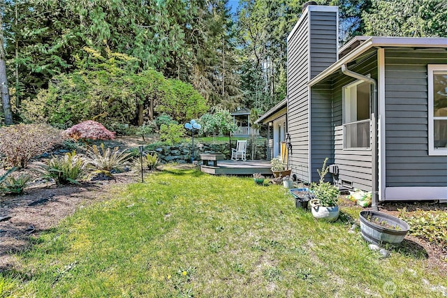 view of yard featuring a deck