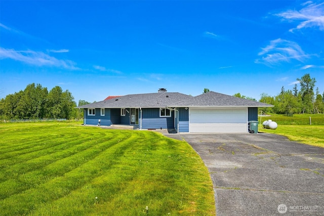206 Kelly Rd, Bellingham, WA 98226 - view of front of property featuring a front lawn, a garage, and aphalt driveway