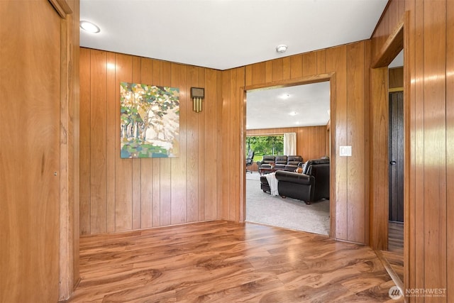 206 Kelly Rd, Bellingham, WA 98226 - hallway with wood walls and wood finished floors