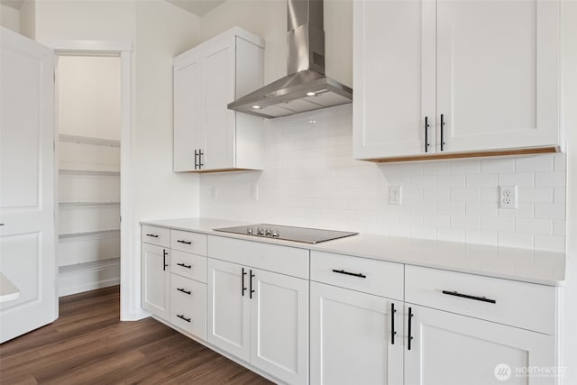 5741 Thornhill Ave SW Unit 326, Port Orchard, WA 98367 - kitchen with wall chimney range hood, black electric cooktop, white cabinets, light countertops, and dark wood-style flooring