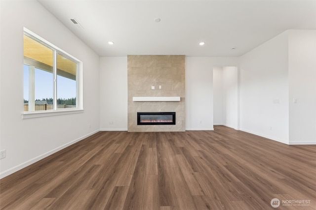 5741 Thornhill Ave SW Unit 326, Port Orchard, WA 98367 - unfurnished living room with a fireplace, wood finished floors, recessed lighting, and baseboards