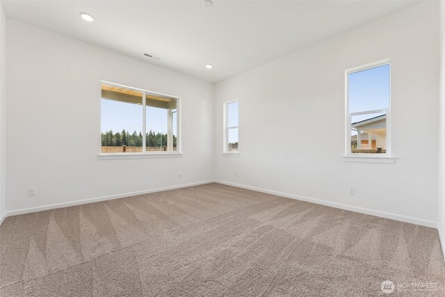 5741 Thornhill Ave SW Unit 326, Port Orchard, WA 98367 - spare room featuring carpet floors, baseboards, and recessed lighting