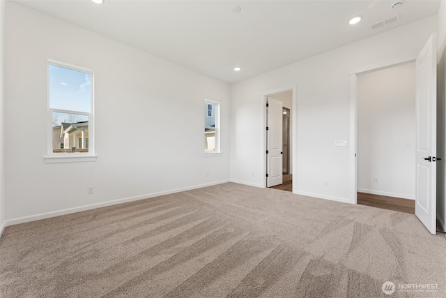 5741 Thornhill Ave SW Unit 326, Port Orchard, WA 98367 - unfurnished bedroom with carpet flooring, multiple windows, baseboards, and recessed lighting