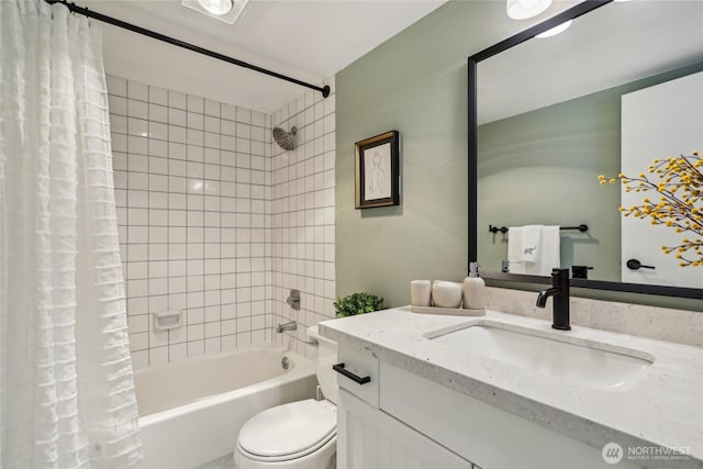 full bath with shower / bath combo with shower curtain, toilet, and vanity