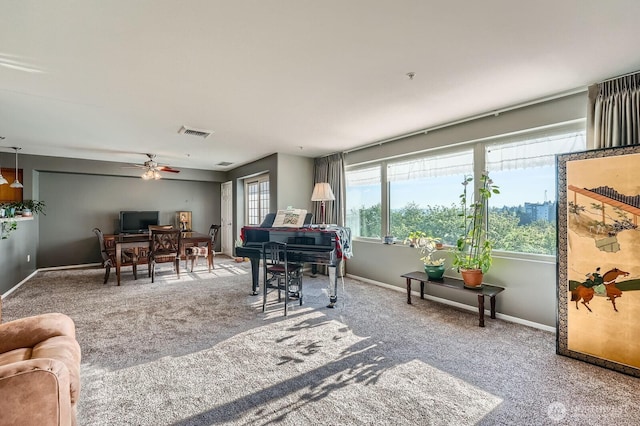 3201 Pacific Ave Unit 305, Tacoma, WA 98418 - living area featuring carpet floors, a desk, a ceiling fan, and baseboards