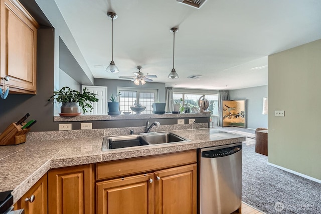 3201 Pacific Ave Unit 305, Tacoma, WA 98418 - kitchen featuring dishwasher, tile counters, a sink, open floor plan, and pendant lighting