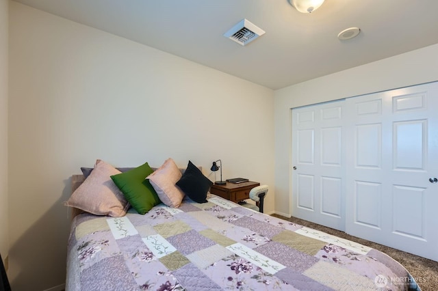 3201 Pacific Ave Unit 305, Tacoma, WA 98418 - carpeted bedroom featuring baseboards and a closet