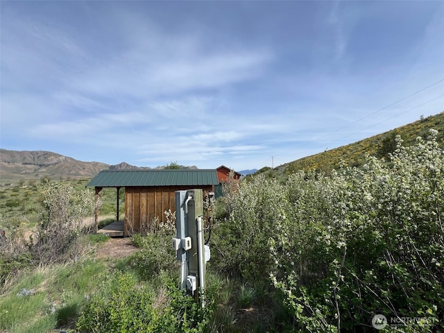 41 Red Tail Ridge Rd, Twisp, WA 98856 - view of yard featuring an outbuilding, a storage shed, and a mountain view