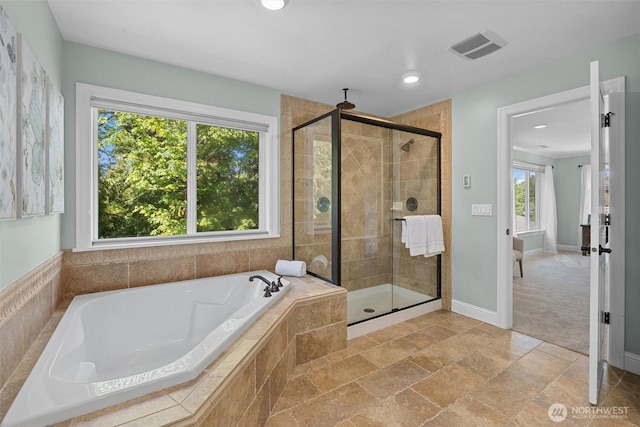 full bath with a garden tub, a stall shower, recessed lighting, and baseboards