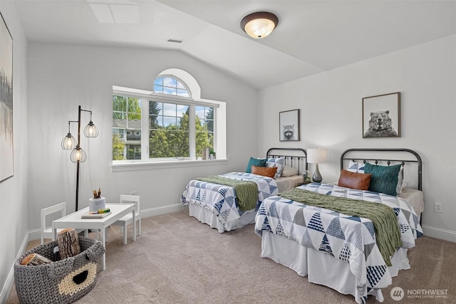 bedroom featuring lofted ceiling, carpet, and baseboards