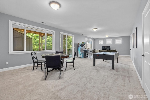 playroom featuring carpet floors, baseboards, and an office area