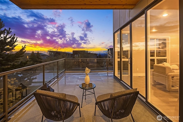 balcony featuring a sunroom
