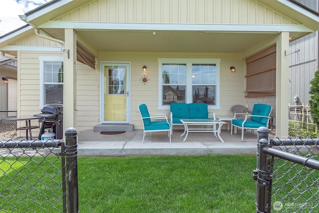 back of house with a patio area and outdoor lounge area
