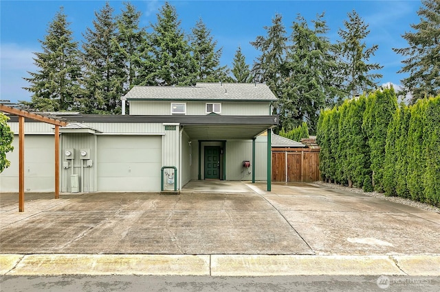 1002 30th St NE, Auburn, WA 98002 - view of front of home with driveway and roof with shingles