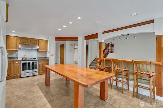 1002 30th St NE, Auburn, WA 98002 - dining room featuring stairway and recessed lighting